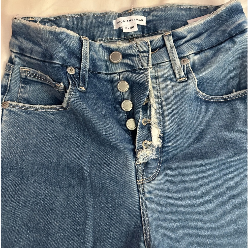 Good American Flare exposed button raw